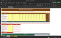 Excel finance dashboard spreadsheet with table of monthly revenue, expenses, and totals